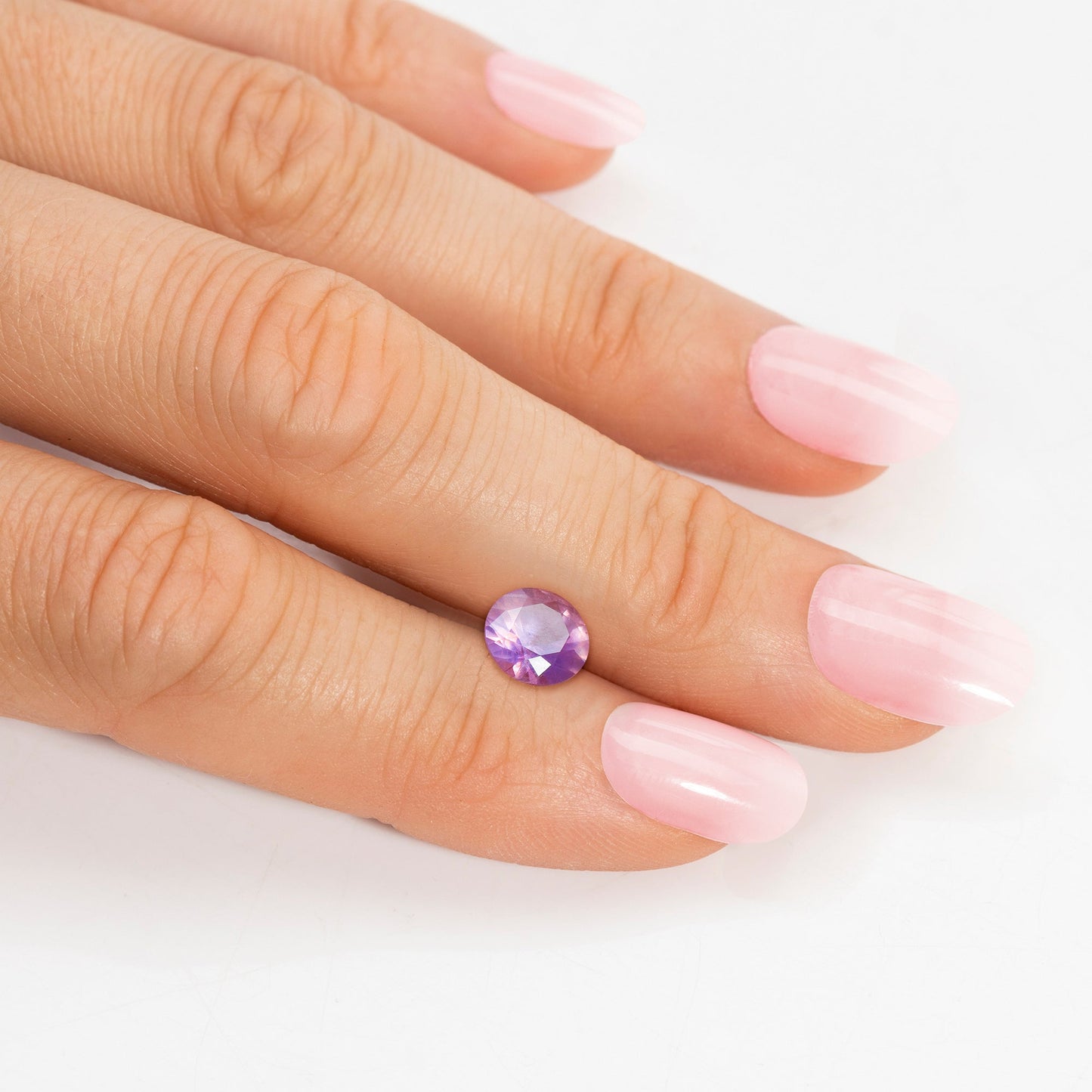 Saphir, Bicolor, Rund, 0,40 ct.