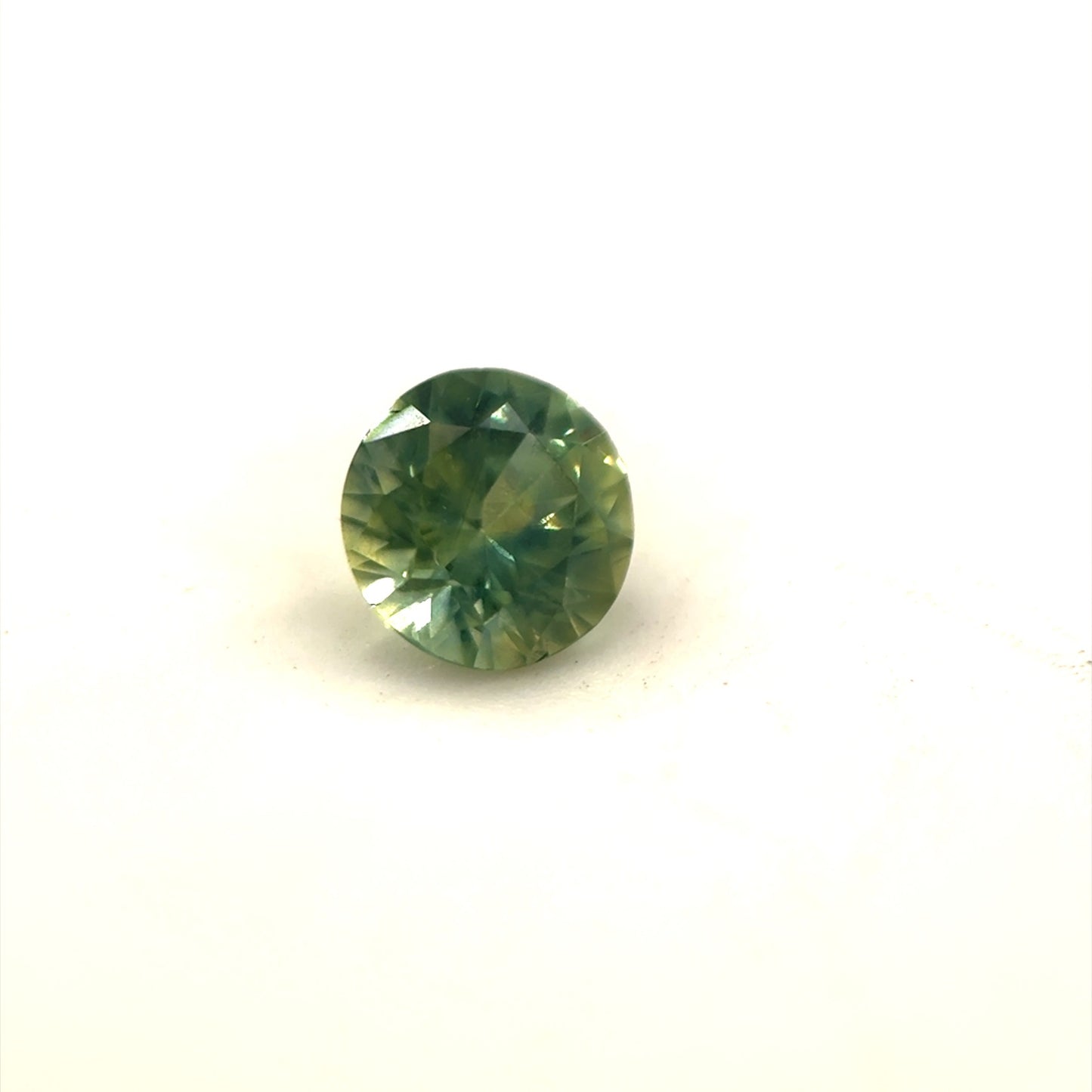 Saphir, Gelb-Grün, Rund, 0,52 ct.